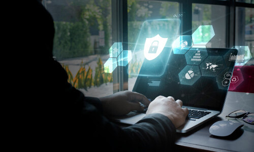 A Person Trying to Hack a Computer