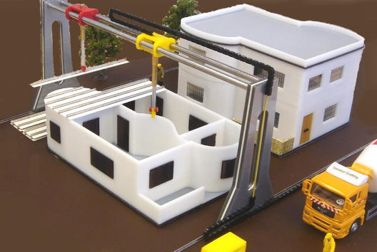 Model of 3D printed construction with a house being built with a 3D printing construction machine next to a concrete mixing truck
