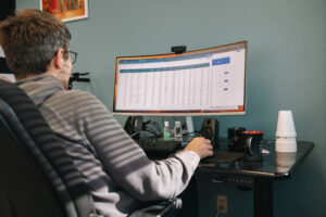 Researcher working on computer
