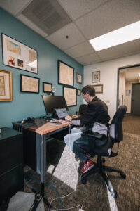 Researcher working on computer