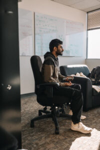 Person seated on office chair