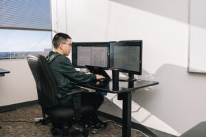 Researcher working on computer