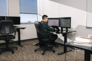 Researcher working on computer