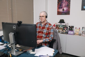 Researcher working on computer