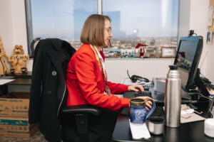 Researcher working on computer