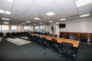 Interior view of office building with modern furniture and workspaces